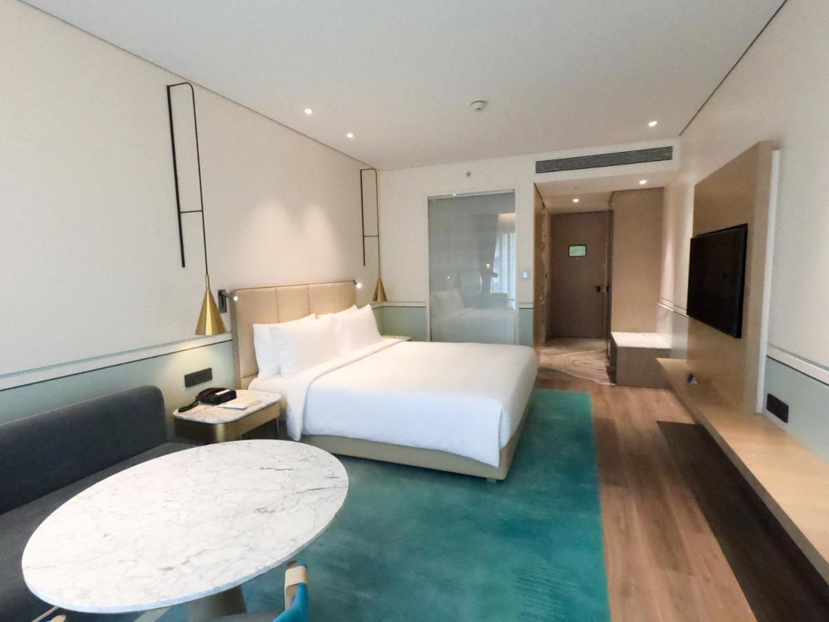 Отель Radisson Blu Mumbai International Airport Экстерьер фото Deluxe Room