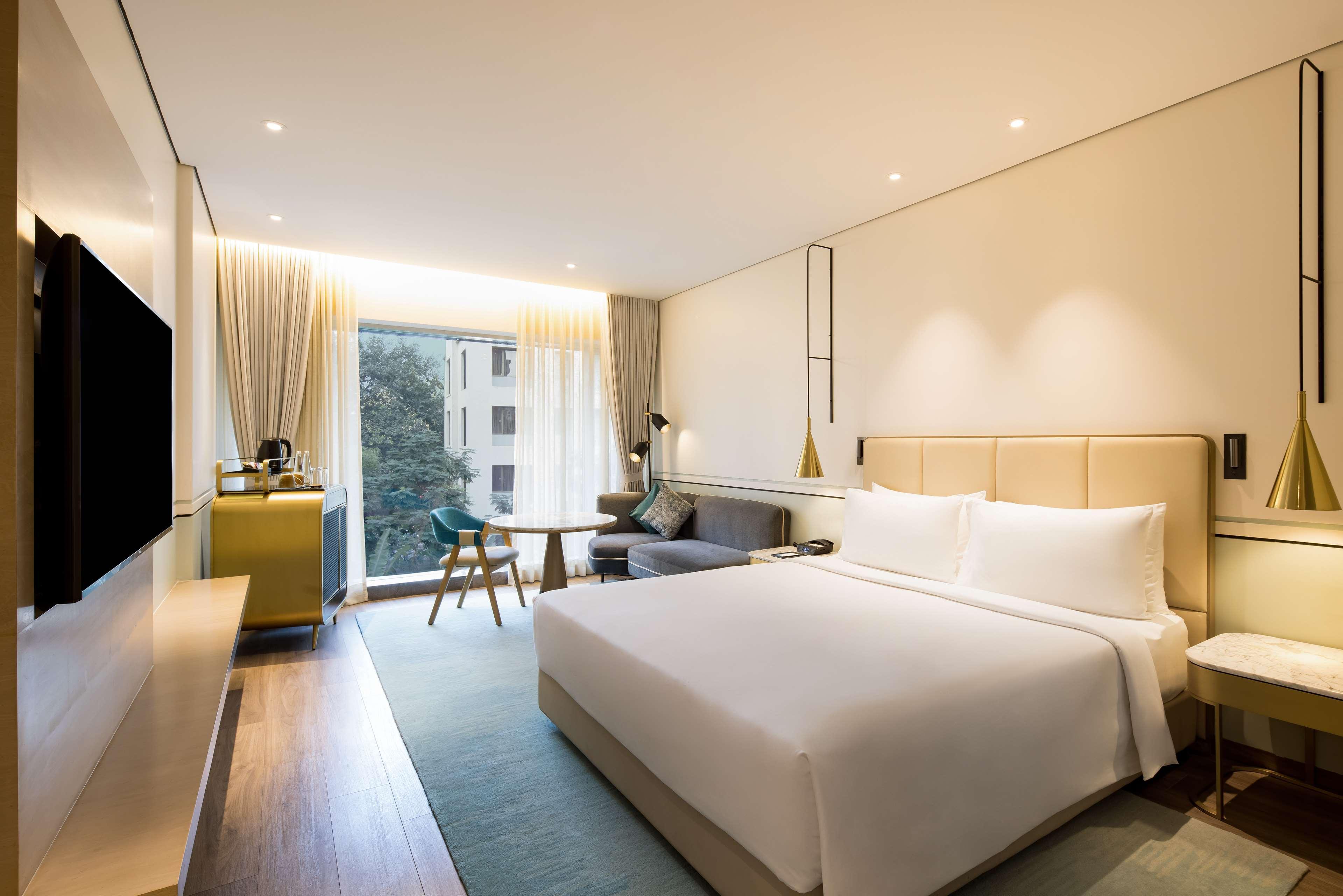 Отель Radisson Blu Mumbai International Airport Экстерьер фото Deluxe Room